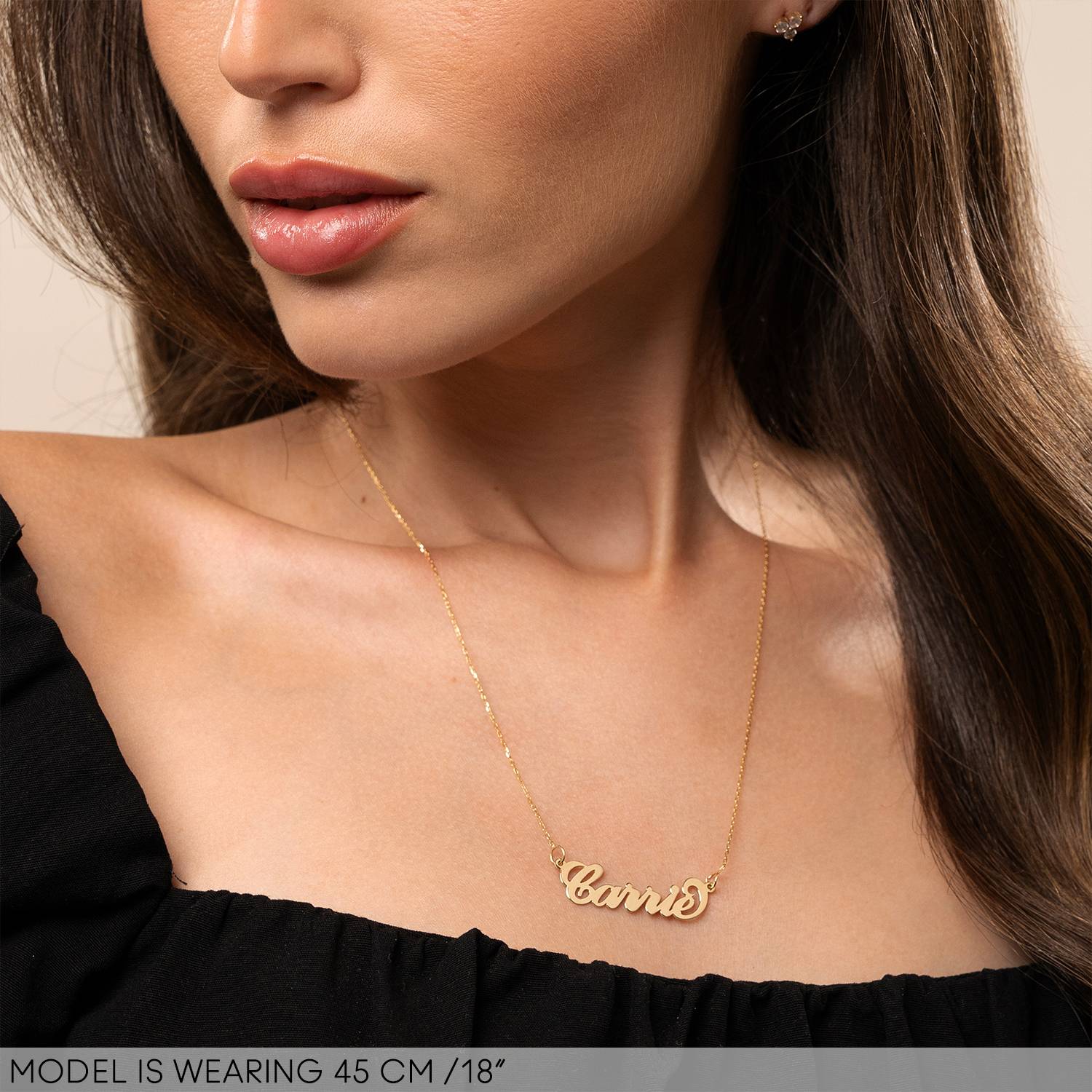 Gold necklace with a on sale name