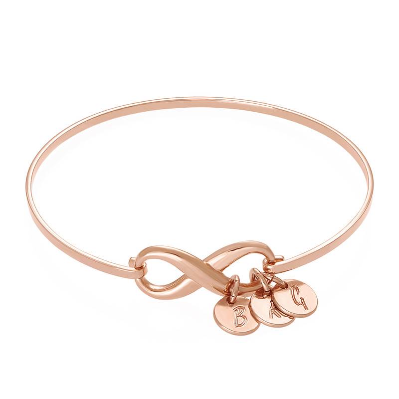 Infinity Bangle Bracelet with Initial Charms in Rose Gold Plating-4 product photo