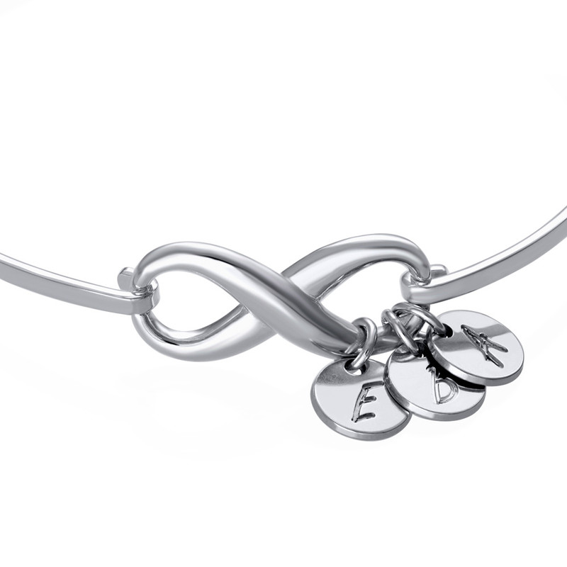 Infinity Bangle Bracelet with Initial Charms in Silver - 1 product photo