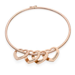 Bangle Bracelet with Heart Shape Pendants in Rose Gold Plating product photo